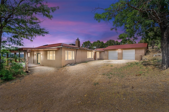 view of front of property featuring a garage