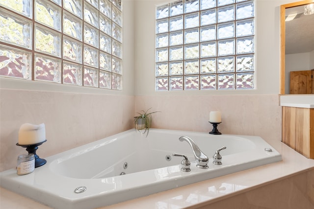 bathroom featuring a washtub