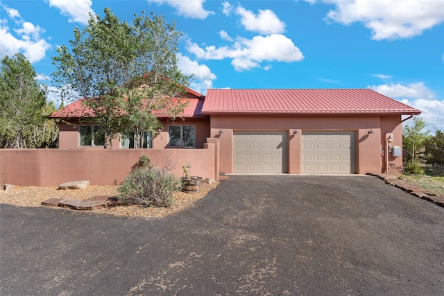 view of front of home featuring a garage