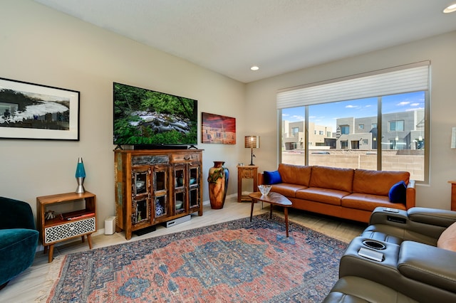 living room with light hardwood / wood-style floors