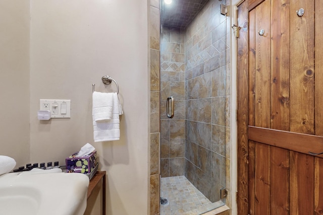 bathroom with an enclosed shower