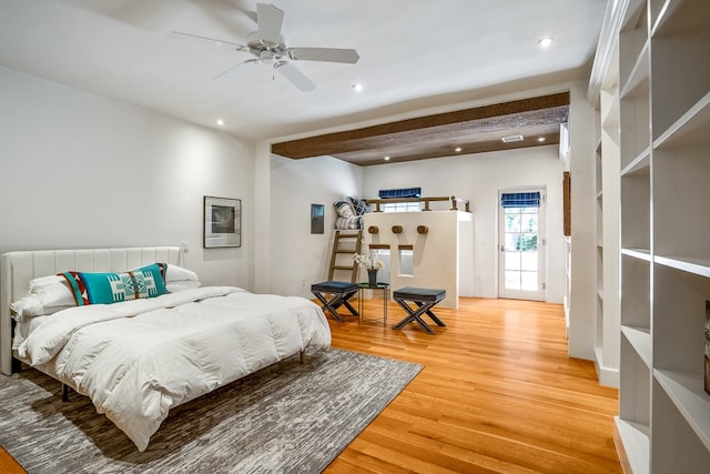 bedroom with ceiling fan and light hardwood / wood-style floors