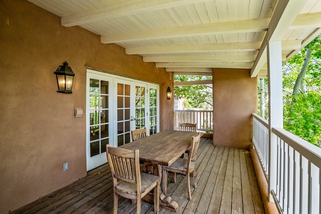 wooden terrace featuring french doors