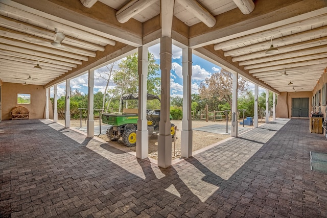 view of terrace featuring ceiling fan