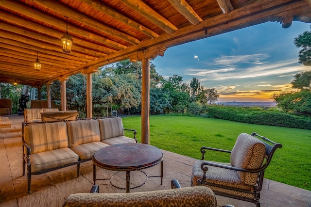 patio terrace at dusk with a lawn