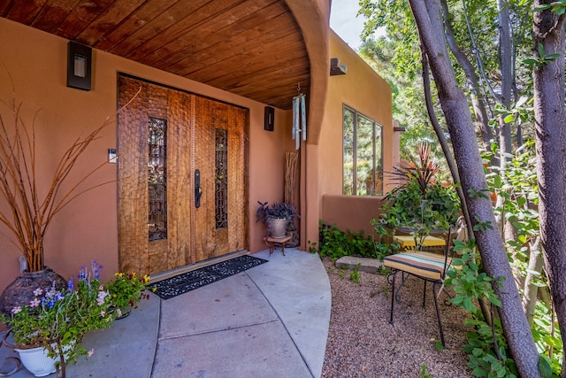 property entrance with a patio area