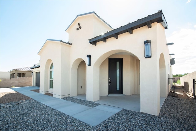 exterior space with a patio area