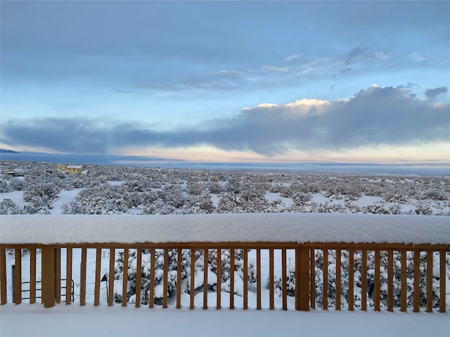 view of snow covered deck