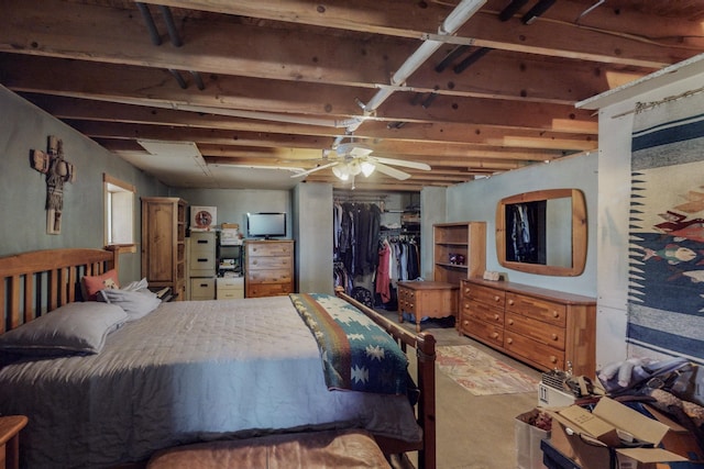 bedroom with ceiling fan and a closet