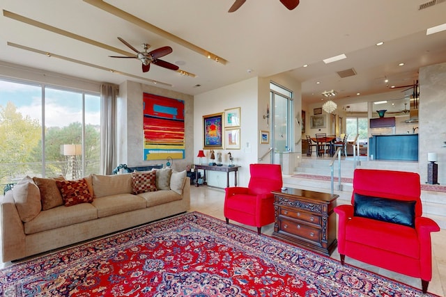 living room with ceiling fan