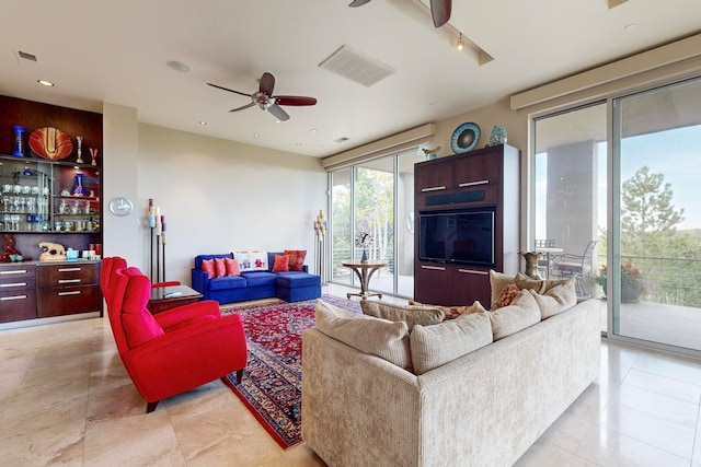 living room with ceiling fan