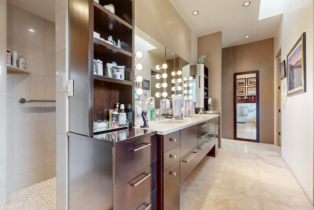 bathroom with vanity and tile patterned flooring