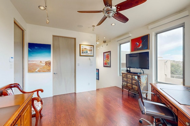 office with ceiling fan, wood-type flooring, and a wall unit AC