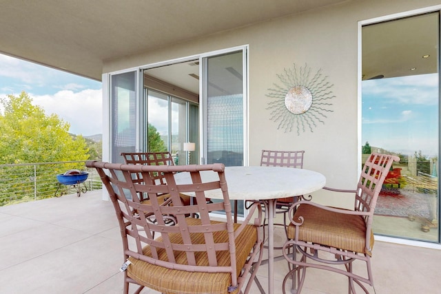 view of patio / terrace with a balcony