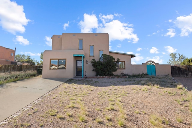 view of adobe home