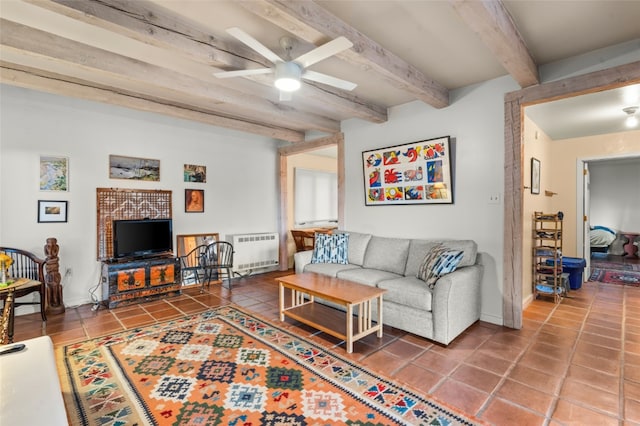 tiled living room featuring beamed ceiling, radiator, and ceiling fan