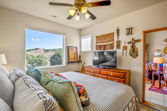 bedroom featuring ceiling fan