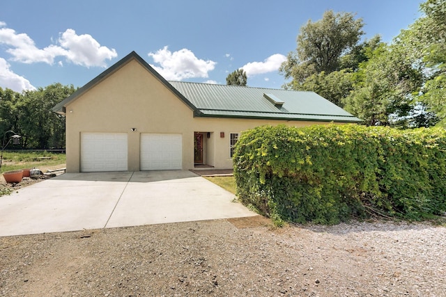 view of property exterior featuring a garage