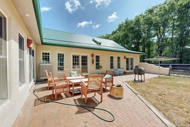 view of patio / terrace featuring an outdoor living space and central AC unit