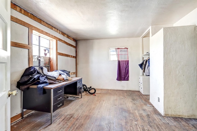 miscellaneous room featuring dark hardwood / wood-style floors