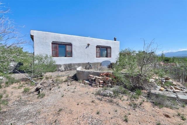 exterior space with a mountain view