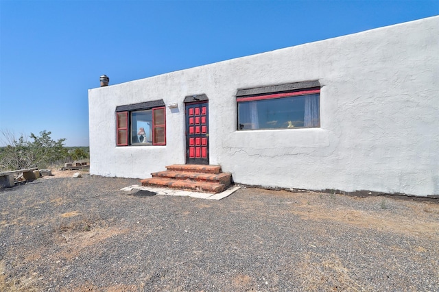 view of pueblo revival-style home