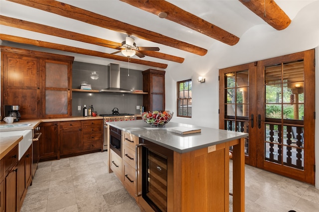 hallway with beamed ceiling and light hardwood / wood-style floors