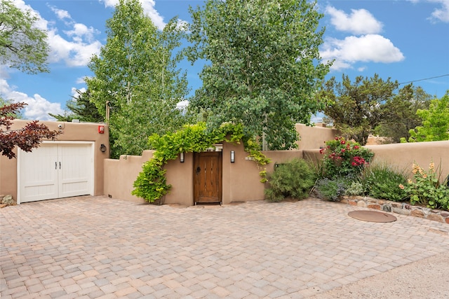 view of patio / terrace with a garage