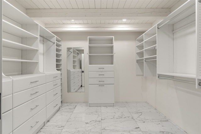 bathroom with vanity, tile patterned flooring, toilet, and tiled shower