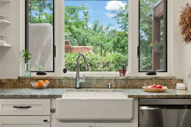 interior space with vanity and a wealth of natural light