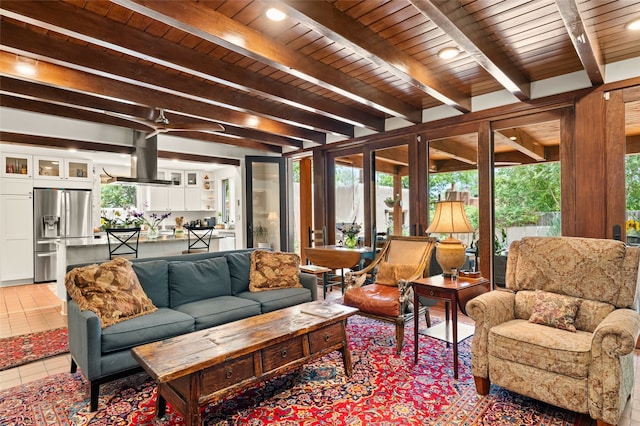 sunroom with wooden ceiling and beam ceiling