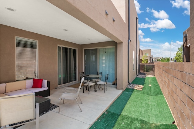 view of patio / terrace with an outdoor hangout area