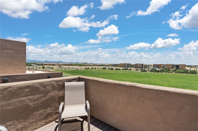 balcony featuring a mountain view