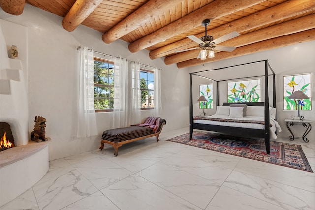 bedroom with wooden ceiling, beam ceiling, and ceiling fan