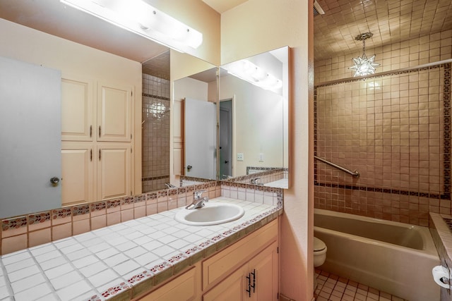 full bathroom featuring shower / bathtub combination, vanity, toilet, and tile patterned floors