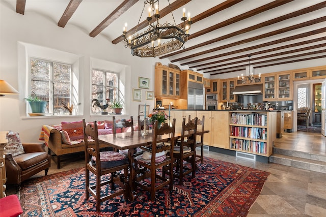 dining area with beamed ceiling and a notable chandelier