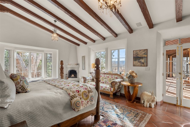 tiled bedroom featuring vaulted ceiling with beams, a large fireplace, and a notable chandelier