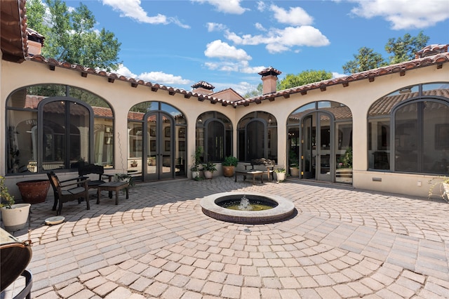 view of patio featuring french doors