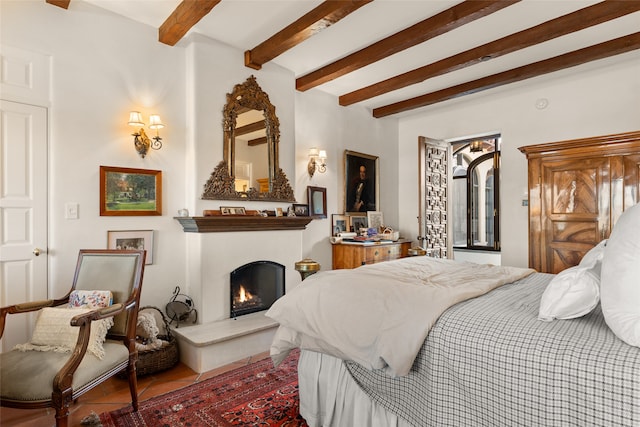 tiled bedroom with beam ceiling