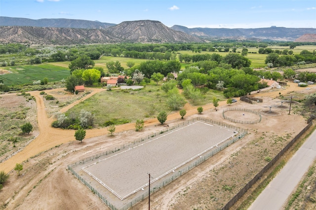 drone / aerial view with a mountain view and a rural view