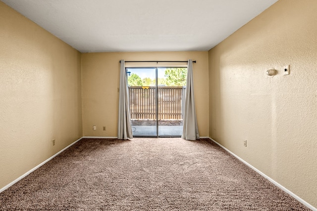 spare room with carpet flooring