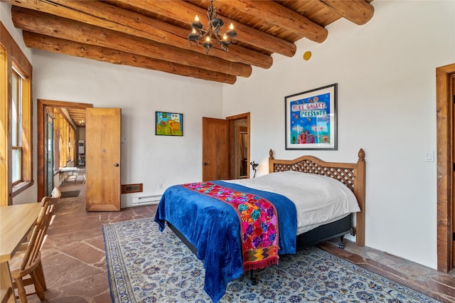 bedroom with beam ceiling, stone tile floors, an inviting chandelier, a baseboard heating unit, and wood ceiling