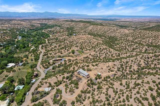 drone / aerial view featuring a mountain view