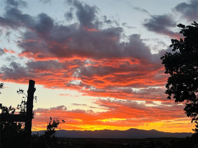 nature at dusk featuring a mountain view