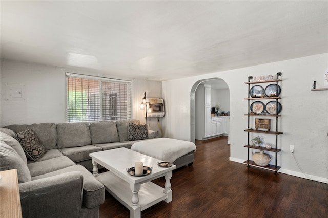 living room featuring dark hardwood / wood-style floors