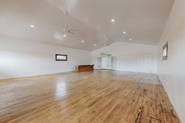 unfurnished living room with light wood finished floors, vaulted ceiling, a ceiling fan, and recessed lighting