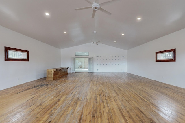 unfurnished living room with light wood-style floors, recessed lighting, vaulted ceiling, and ceiling fan