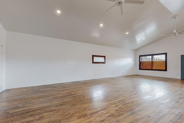 empty room with lofted ceiling, wood finished floors, a ceiling fan, and recessed lighting