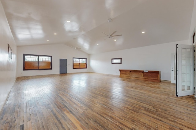 unfurnished living room featuring a ceiling fan, recessed lighting, wood-type flooring, and high vaulted ceiling