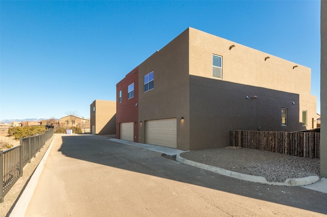 exterior space featuring a garage